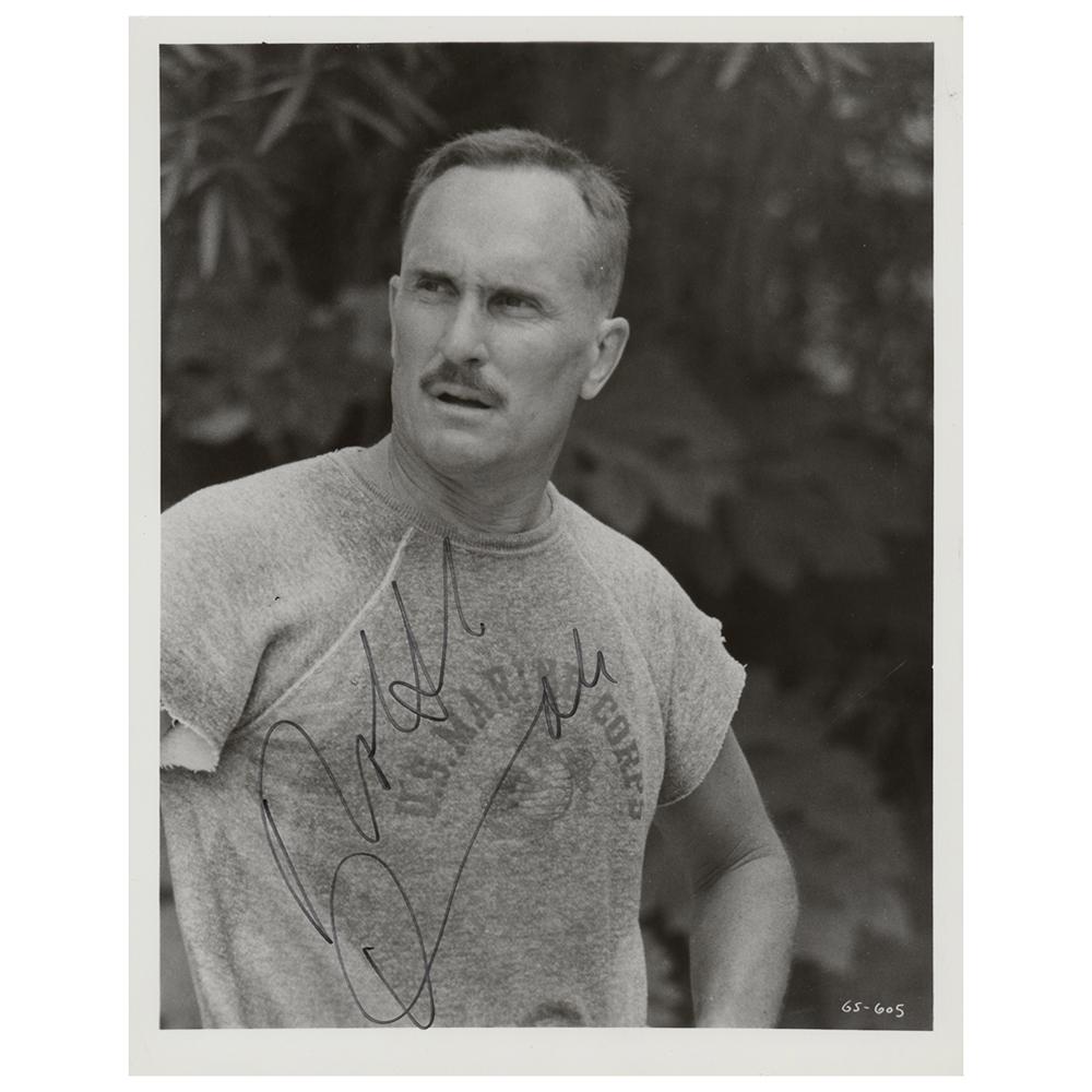 Robert Duvall Signed Photograph: Glossy 8 x 10 photo of Robert Duvall in his Oscar-nominated role as the title character from the 1979 drama film The Great Santini, signed in black felt tip. In fine condition, with light overall emul