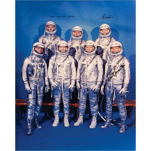 Mercury Astronauts: Cooper, Carpenter, and Schirra: Large color satin-finish 16 x 20 photo of the iconic group shot of the original seven Mercury astronauts posing together in their silver space suits, signed in black felt tip, "The Original Seven,