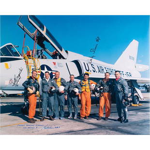 Mercury Astronauts: Cooper, Carpenter, and Schirra: Crystal-clear color satin-finish 20 x 16 photo of the original Mercury astronauts posing in front of a Convair F106-B aircraft at Langley Air Force Base on January 20, 1961, signed in black felt tip,