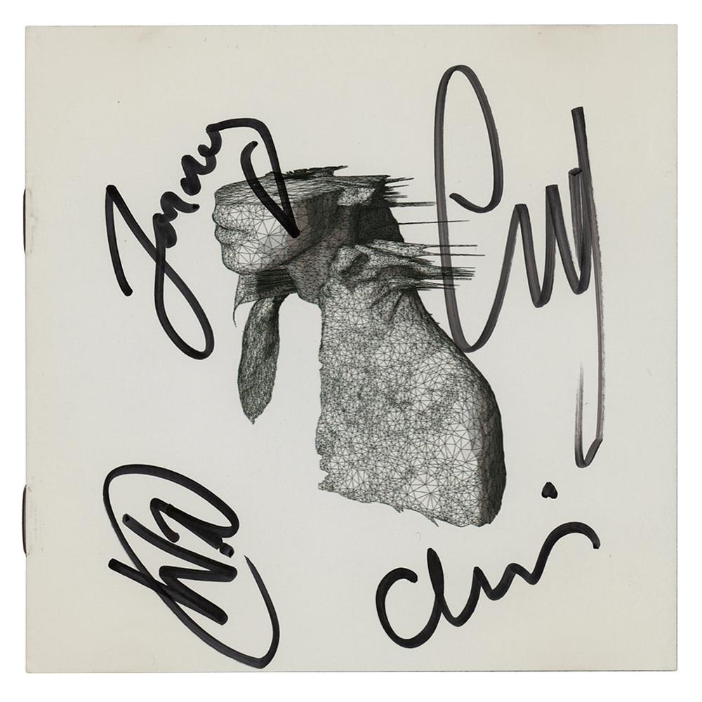Coldplay Signed CD Booklet: CD booklet for the Coldplay album A Rush of Blood to the Head, signed on the front cover in black felt tip by Chris Martin, Jonny Buckland, Guy Berryman, and Will Champion. In very fine condition. The