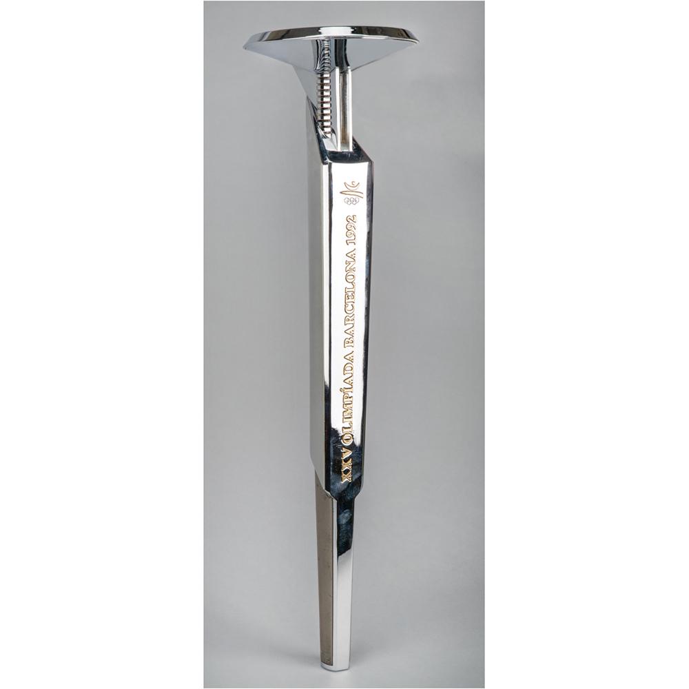 Barcelona 1992 Summer Olympics Torch: Official 1992 Barcelona Olympics torch, constructed of aluminum and plastic, measuring 26â€³ in length and 7â€³ at its widest point, designed by Andre Ricard. The metal