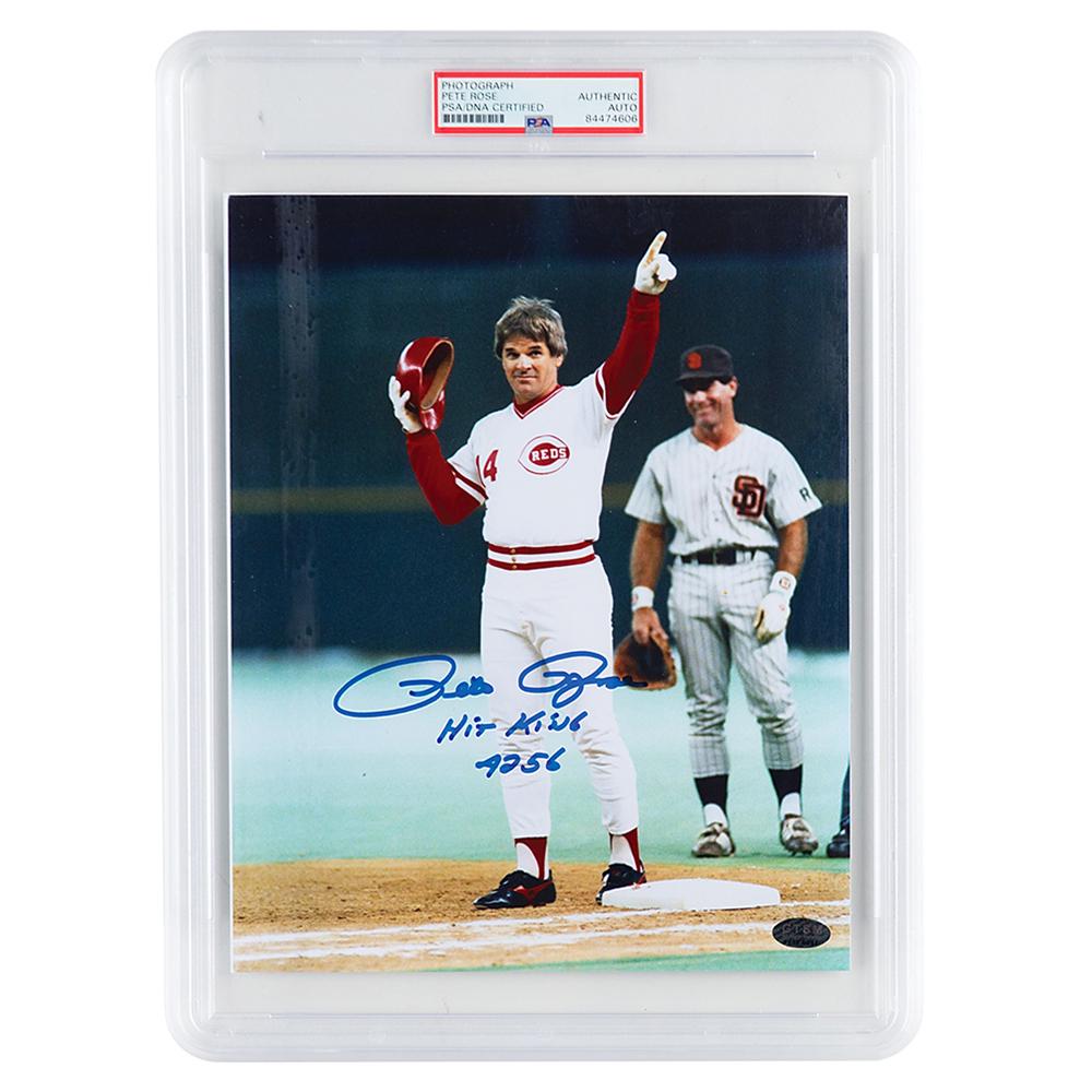 Pete Rose Signed Photograph: Color glossy 8 x 10 photo of Rose after breaking Ty Cobb's all-time hits record, signed in blue felt tip, "Pete Rose, Hit King, 4256." In fine condition. Encapsulated in a PSA/DNA authentication holde