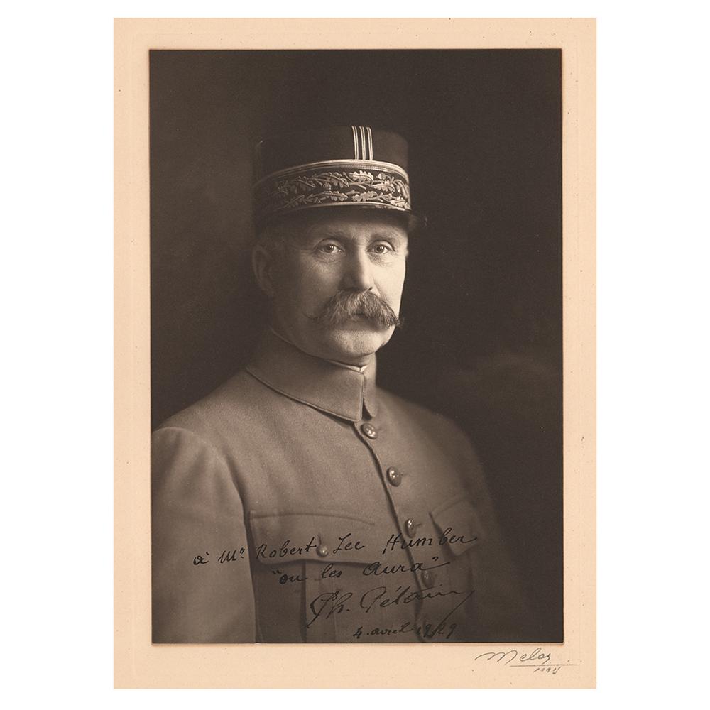 Philippe Pétain Signed Photograph: Uncommon matte-finish 5.75 x 8.25 portrait of Petain in uniform by Melcy of Paris, affixed to its original 9.25 x 13.75 mount, signed and inscribed in fountain pen, "A Mr. Robert Lee Humber, 'on l