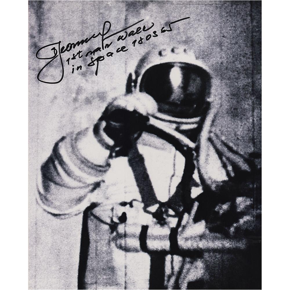 Alexei Leonov Signed Photograph: Satin-finish 8 x 10 photo of Alexei Leonov during his historic first space walk, signed in black felt tip, with Leonov adding "1st Man Walk in Space, 18 03 1965." In very fine condition, with grainy i