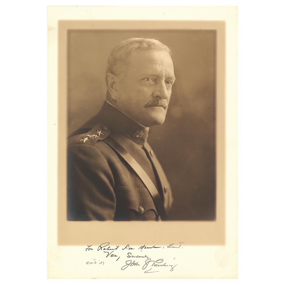 John J. Pershing Signed Photograph: Handsome matte-finish 9.25 x 13.25 photo of Pershin in his four-star uniform by Harris & Ewing, signed and inscribed in the lower border in fountain pen, "For Robert Lee Hunter, Lieut., Very Since