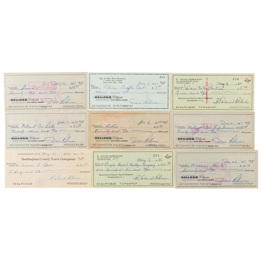 Dave Robinson (9) Signed Checks: Hall of Fame linebacker (born 1941) for the Green Bay Packers and Washington Redskins, and two-time Super Bowl champion (I and II). Nine personal checks signed by Green Bay Packers legend Dave Robinso