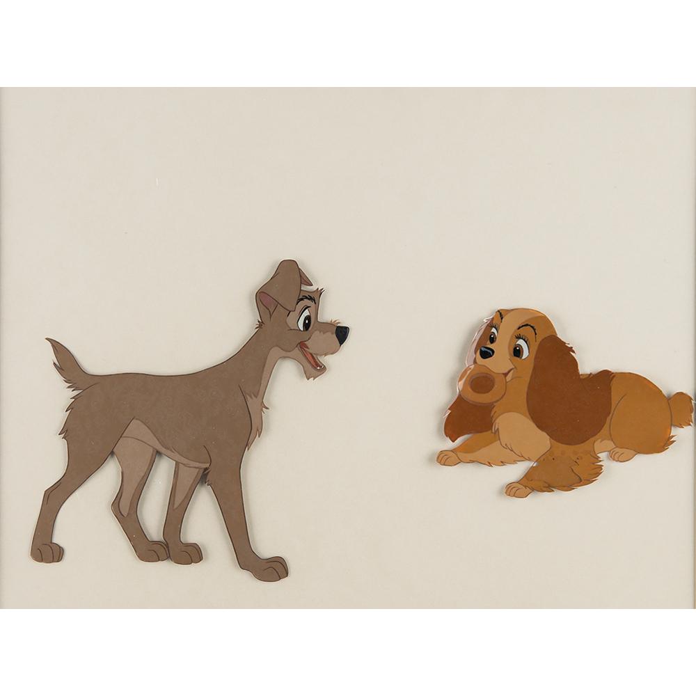 Lady and Tramp production cels from Lady and the Tramp: (Walt Disney Studios, 1955) Original production cels of the main title characters from Lady and the Tramp, depicting the lovable dogs in warmly colored full-length poses, with Tramp in profile and Lad