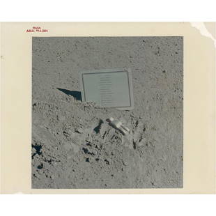 Apollo 15: Fallen Astronaut Original 'Type 1' Photograph: Official color glossy 10 x 8 red-numbered NASA photo (AS15-88-11894), showing the 'Fallen Astronaut' statue created by Belgian artist Paul Van Hoeydonck, with its commemorative plaque honoring the fou