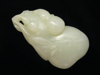 Antique Jade Gourd Carving: 19th Century white jade carving of double gourd, finely polished. Measurement: L: 7.2cm *For a similar item, please refer to Cowans Auction, July 27, 2012, Lot 148*