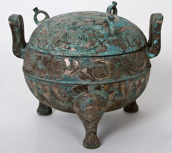 Bronze Tripod Vessel and Cover,China,Warring States: Chinese Bronze Tripod Vessel and Cover (Ding), China, Warring States Period (475-221 BC). Finely cast with silver inlay and an elaborate whorl motif, the globular body with everted handles, raised on