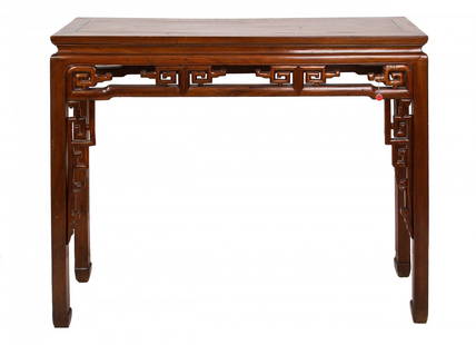 Huanghuali Altar Table - Sothebys Parke-Bernet, 19th C.: Huanghuali Altar Table, Sothebys Parke-Bernet, 19th Century. Floating panel top set within a rectangular frame over a scroll carved frieze, supported on square legs terminating in hoof feet. 