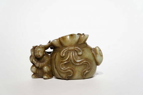 Very Fine Celadon Jade Group 18th/19th Century: Very Fine Celadon Jade brusher washer/group, 18th/19th Century. Carved with exquisite detail depicting a boy holding a lotus vine carrying a large bag with relief bow-tie design and foliate rim, each