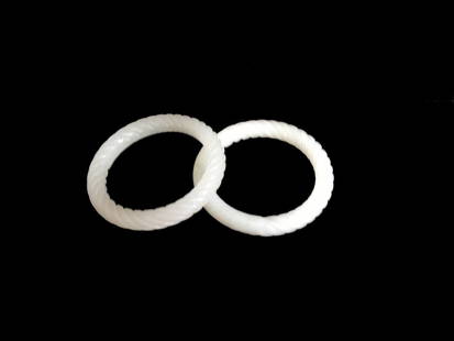 Two White Jade Twisted Bangles.: Two white jade twisted rope bangles. Both showing good translucency and well polished. Inner Diamter: 2.4 inches (6.1 cm)