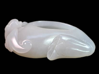 Fine White Jade Water Coupe: Fine White Jade Water Coupe. The translucent stone finely carved in the shape of a water coupe with a bat and lotus plant carved in high relief. Length: 2.6 inches (6.6 cm)