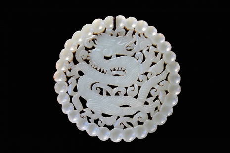 Fine White Jade Openwork Dragon Pendant, Qing Dyn.: Fine White Jade Openwork Dragon Pendant, Qing Dynasty. The translucent stone carved in a circular shape with a dragon. Measurement: 3.1 x 1.9 inches (7.8 cm x 4.8 cm)