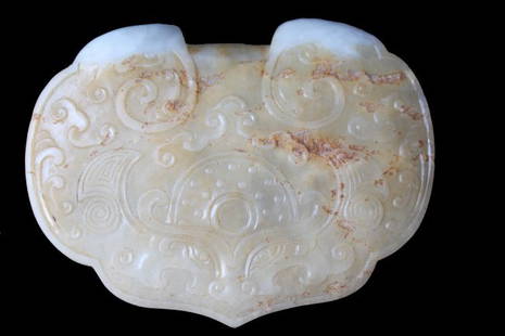 Antique Jade Pendant: Antique Jade Pendant. Carved with various archaistic motifs in low relief. Measurement: 3 x 2.25 inches (7.62 x 5.7 cm)