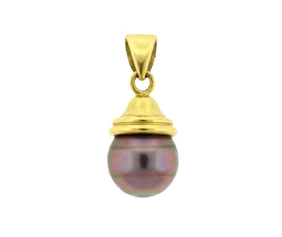 18K Gold Tahitian South Pearl Dangle Pendant: METAL: 18K gold. GEMSTONES: Tahitian South Sea pearl 12mm. MEASUREMENTS: pendant is 27mm long (including bale) x12mm at widest point. TESTED: 18K. WEIGHT: 6.2 grams.Gemstones have not been graded for 