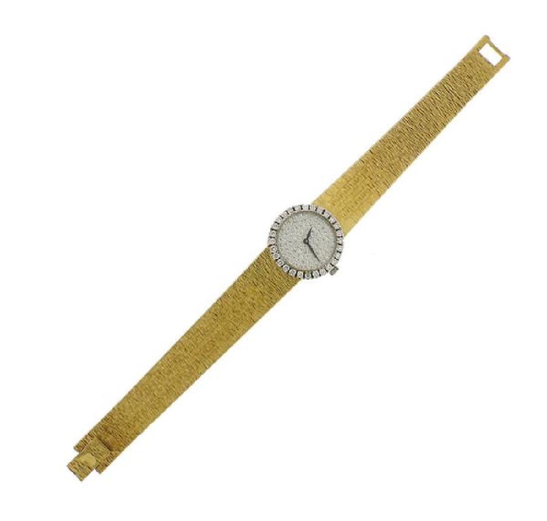 Piaget 18k Gold Diamond Dial Watch: METAL: 18k gold. MEASUREMENTS: case - 22mm in diameter excl crown. Band - 6 4/8" long. Full diamond dial, diamond bezel. MOVEMENT:quartz running order. WEIGHT: 51.8 grams.Gemstones have not been 