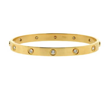 Cartier Love 18k Yellow Gold Diamond Bangle Size 18: METAL: 18k yellow gold. GEMSTONES: approx. 0.96ctw (10 diamonds). MEASUREMENTS: Bangle is Cartier size 18, measures 6.2mm wide. MARKED: 18 750 cartier ng4727. WEIGHT: 33.5g. comes with screw driver an