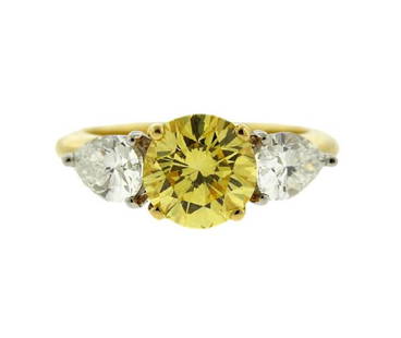 Tiffany &amp; Co GIA Platinum 18k Gold Diamond: METAL: platinum, 18k gold. GEMSTONES: fancy intense yellow diamond- 1.62ct white diamonds. MEASUREMENTS: Ring is a size 4 1/4. MARKED: tiffany &amp; co 18k plat. WEIGHT: 4.4 grams. Gemstones have not