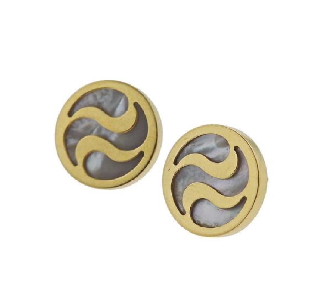 Bulgari Bvlgari18K Gold MOP Optical Stud Earrings: METAL: 18K gold. GEMSTONES: mother of pearl. MEASUREMENTS: earrings are 13mm in diameter. MARKED: Bvlgari Made in Italy 750. WEIGHT: 5.9 grams. Come with box. Gemstones have not been graded for color