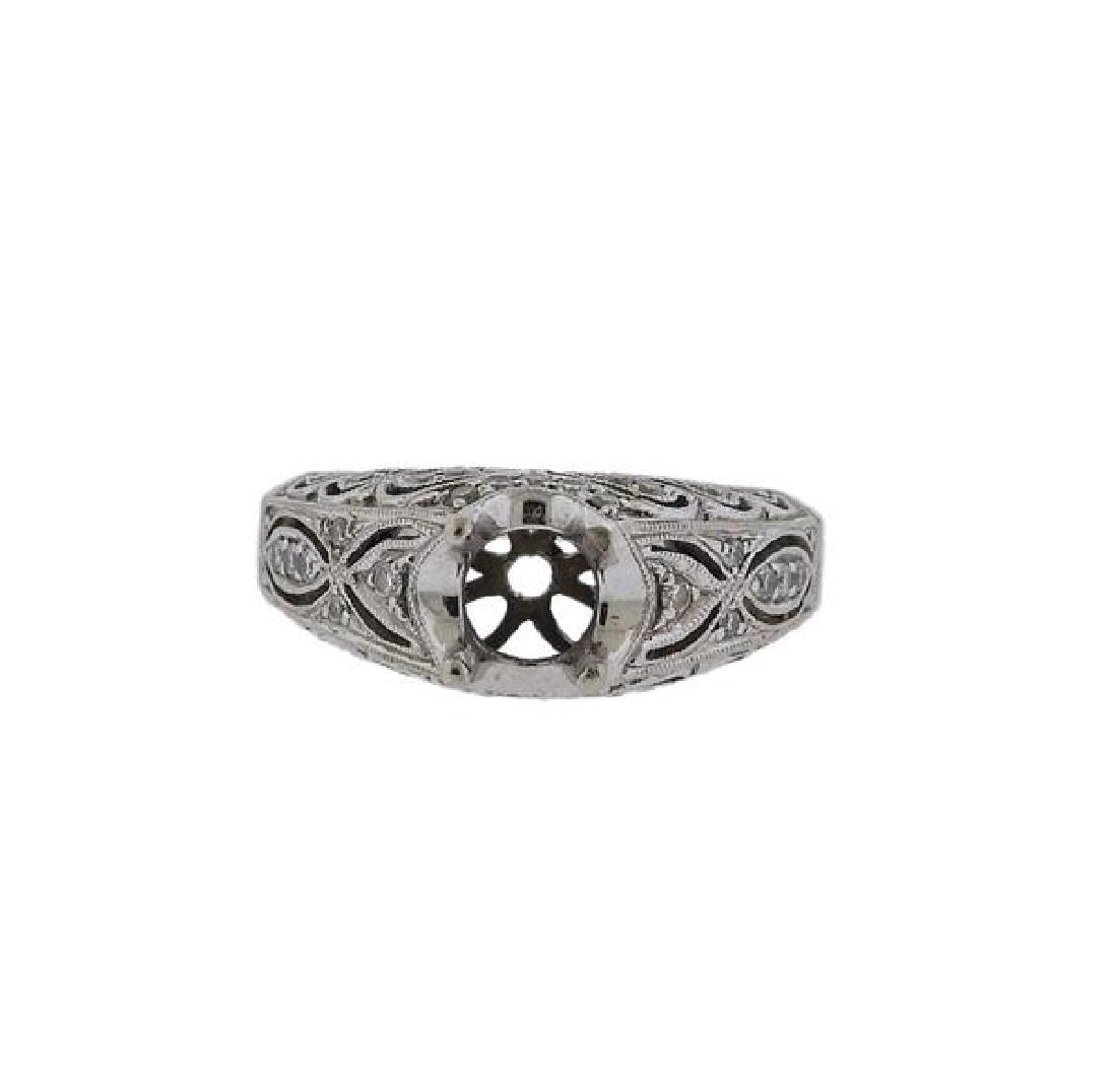 18k Gold Diamond Engagement Ring: METAL: 18k Gold. MEASUREMENTS: Ring size - 7 1/2, ring top is 8.3mm wide. Center will fit approx. 5.2mm stone. GEMSTONES: Diamonds - 0.30ctw. MARKED: Simon G, 181, 0.30. WEIGHTL 6 grams.Gemstones have