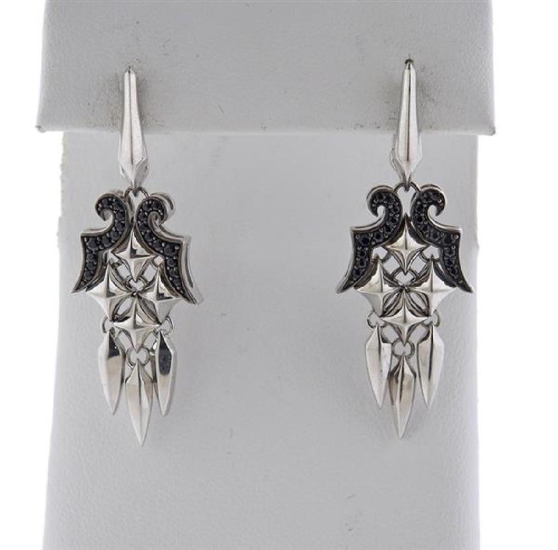 Stephen Webster Superstud Sterling Sapphire Drop: METAL: sterling silver. GEMSTONES: black sapphires. MEASUREMENTS: earrings measure 43mm long X 15mm. MARKED: Webster 925. WEIGHT: 8.8 grams Gemstones have not been graded for color and clarity, and te