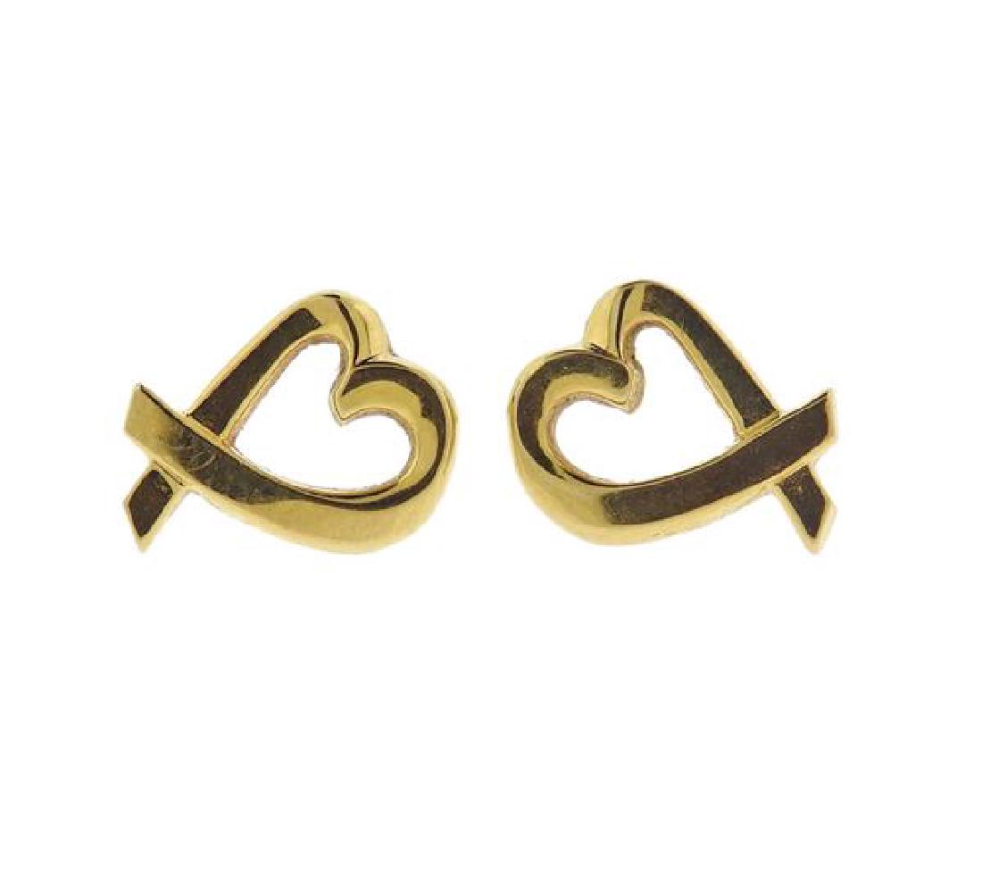 Tiffany & Co Paloma Picasso 18K Gold Heart: METAL: 18K yellow gold. MEASUREMENTS: earrings are 10.5 x 8mm at widest point. MARKED: T& Co 750 Paloma Picasso. WEIGHT: 2.4 grams. Come with pouch. Gemstones have not been graded for color and cl