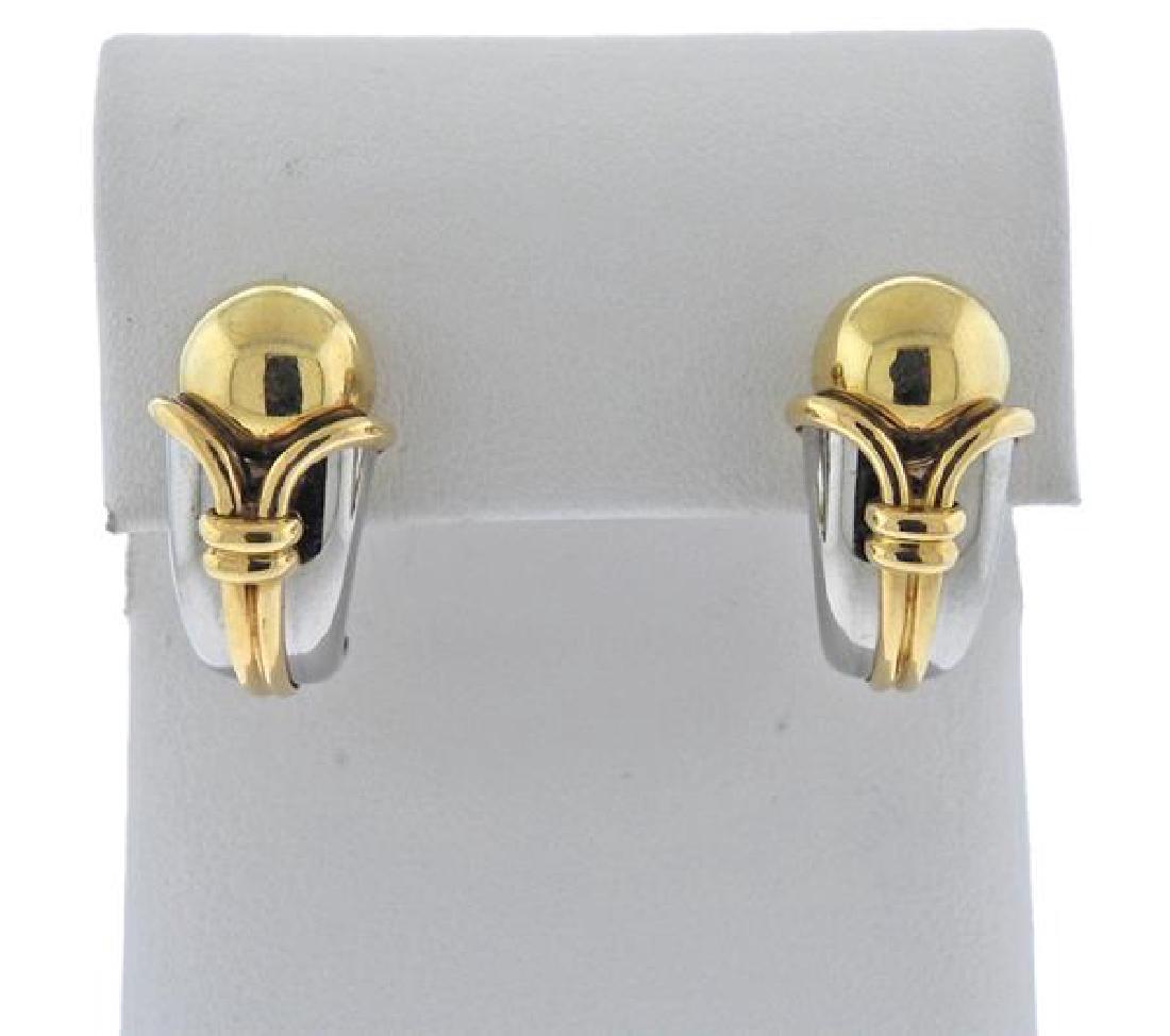 Bulgari Bvlgari 18K Gold Stainless Steel Earrings: METAL: 18K Gold, Stainless Steel. MEASUREMENTS: Earrings are 23mm x 12.2mm at widest points. MARKED: Bvlgari, 750. WEIGHT: 17.5 grams. Gemstones have not been graded for color and clarity, and tested