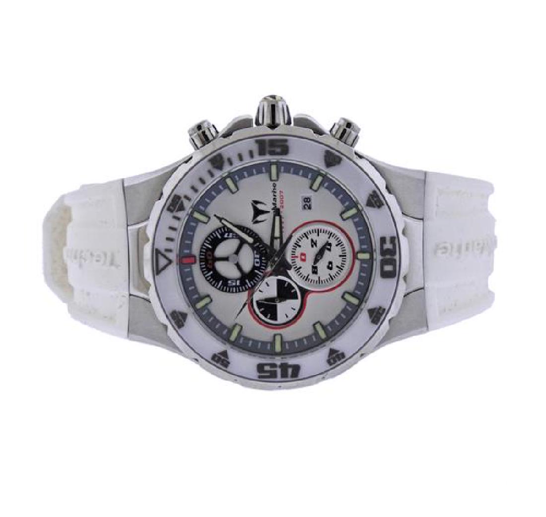 TechnoMarine Jubilee Edition Chronograph Watch: METAL: Stainless Steel. MEASUREMENTS: Case - 42mm in diameter excl crown/pusher. White rubber band with TM buckle. White dial with 3 register chronograph, luminous markers/hands, date at 4 o'clock