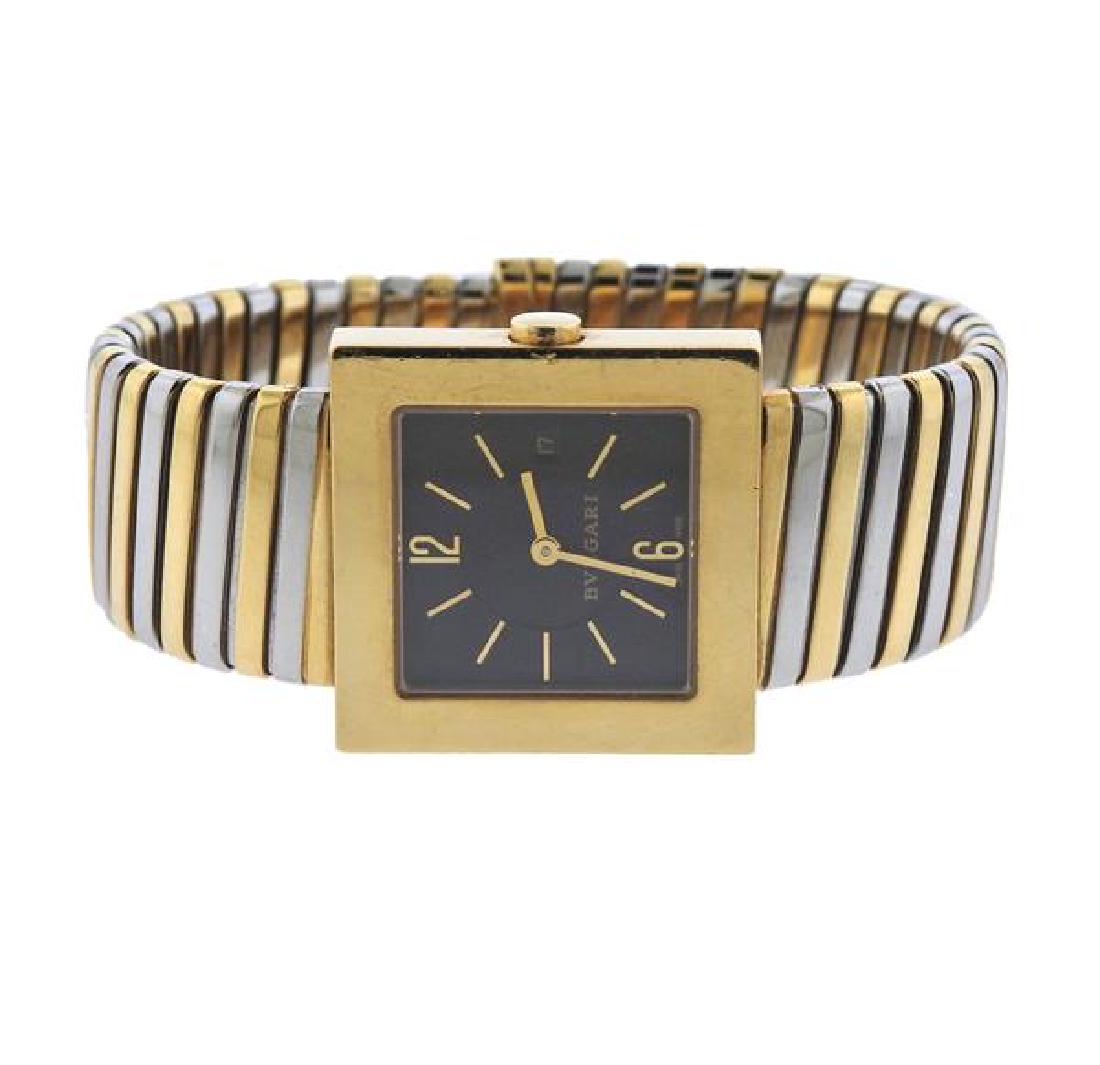 Bvlgari Bulgari Square Tubogas 18k Gold Steel Watch: METAL: 18k Gold/ Stainless Steel. MEASUREMENTS: Case - 27mm x 26mm excl crown. Band will fit up to 6.75" wrist, band is 19mm wide. Black Bvlgari dial with gold stock markers, date at 3 o'cloc
