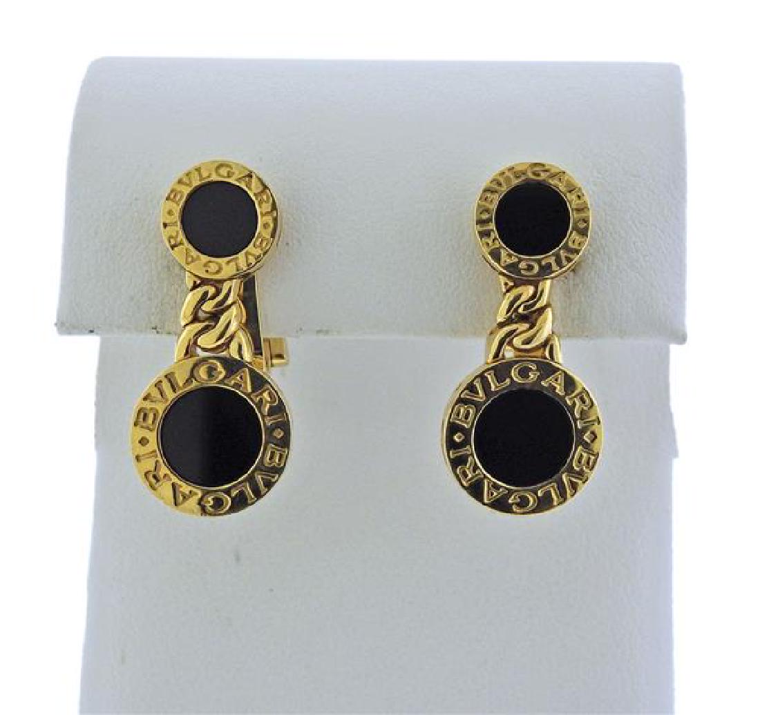 Bvlgari Bulgari 18K Gold Onyx Earrings: METAL: 18K gold. GEMSTONES: onyx. MEASUREMENTS: earrings are 29mm long x 13mm at widest point. MARKED: Bvlgari 750 Made in Italy. WEIGHT: 17.6 grams.Gemstones have not been graded for color and clarit