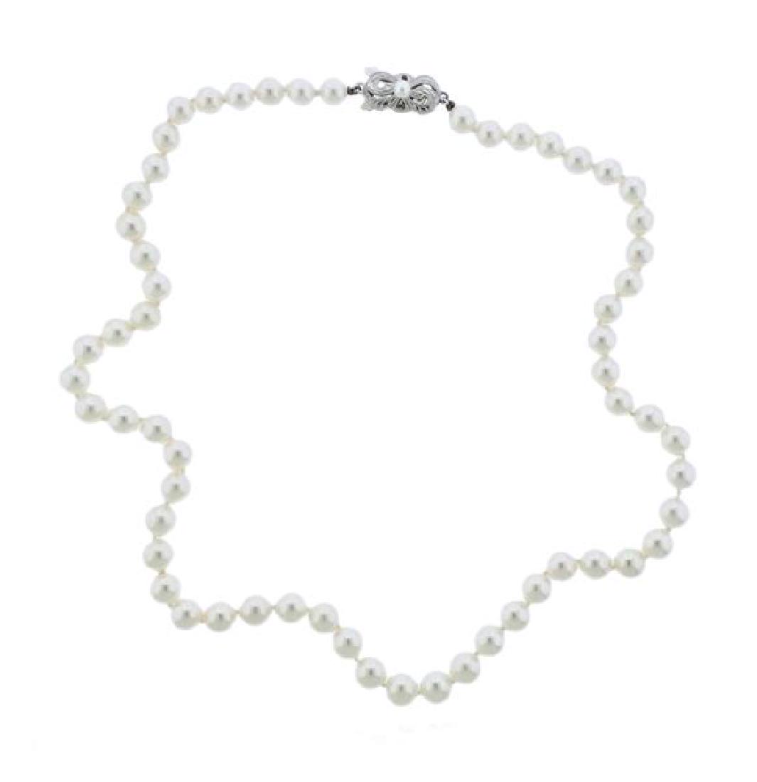 Mikimoto 18K Gold Clasp Pearl Necklace: METAL: 18K gold. GEMSTONES: pearls 3.8- 7mm. MEASUREMENTS: necklace is 17.5" long x 7mm at widest point. MARKED: 750 M. WEIGHT: 26.9 grams.Gemstones have not been graded for color and clarity ,an