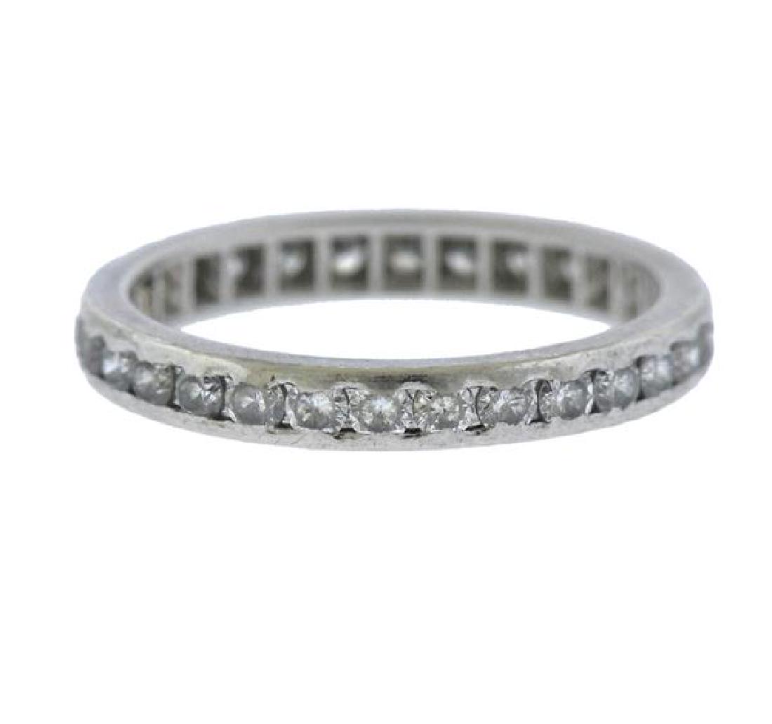 Platinum Diamond Eternity Wedding Band Ring: METAL: platinum. GEMSTONES: diamonds- approx. 0.50ctw (all stones abraded). MEASUREMENTS: ring size 5.75. Band is 3mm wide. TESTED: Platinum. WEIGHT: 3.5 grams.Gemstones have not been graded for color
