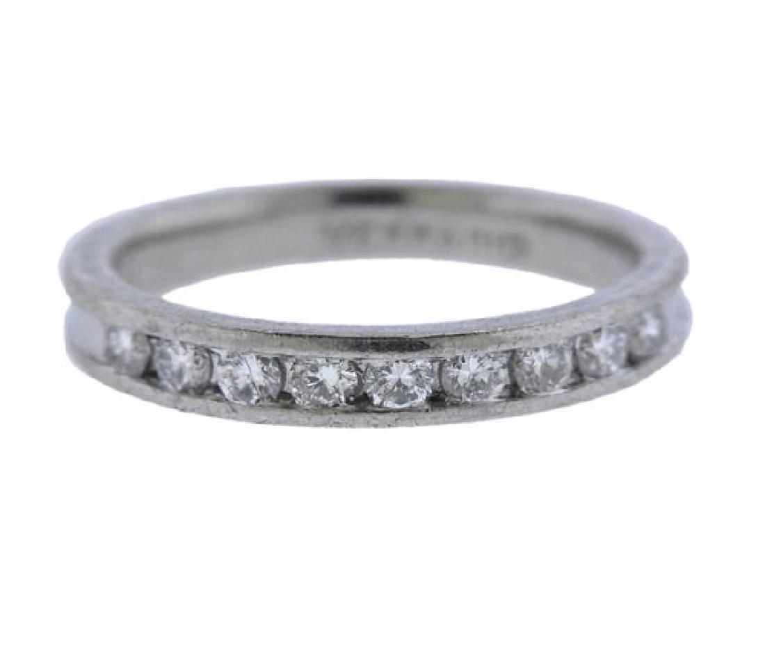 Verragio Platinum Diamond Wedding Band Ring: METAL: platinum. GEMSTONES: diamonds-approx. 0.45ctw. MEASUREMENTS: ring size 7. Band is 3.5mm wide. MARKED: Verragio Plat. WEIGHT: 5.9 grams.Gemstones have not been graded for color and clarity ,and