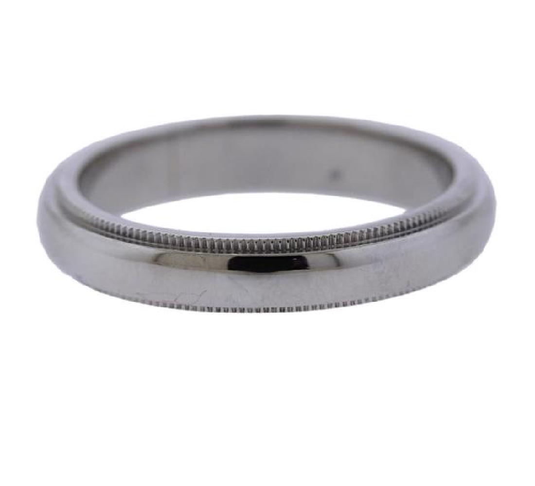 Tiffany & Co Platinum 4mm Wedding Band Ring: METAL: Platinum. MEASUREMENTS: Ring size - 8, ring is 4mm wide. MARKED: Tiffany & Co, pt950. WEIGHT: 8.4 grams.Gemstones have not been graded for color and clarity ,and tested for clarity and colo