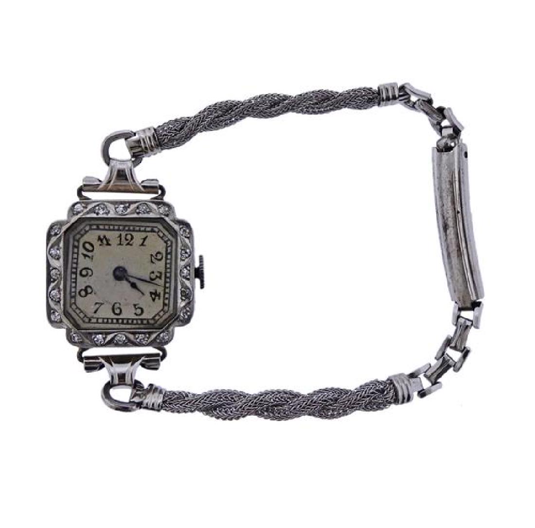 Antique Art Deco Gold Diamond Lady's Watch: METAL: 10K Gold case/ Gold Filled Bracelet. MEASUREMENTS: Case - 21mm excl crown x 21mm. Bracelet is 6.5" long (including the case). Crown is not set. MOVEMENT: Not running. Watches are guarantee