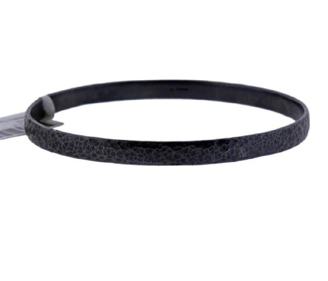 Gurhan Midnight Blackened Silver Bangle Bracelet: METAL: Blackened Silver. MEASUREMENTS: Inner diameter is 2 3/8", bracelet is 5mm wide. MARKED: BA02214/.925, Gurhan, 925. WEIGHT: 13.8 grams.Gemstones have not been graded for color and clarity ,