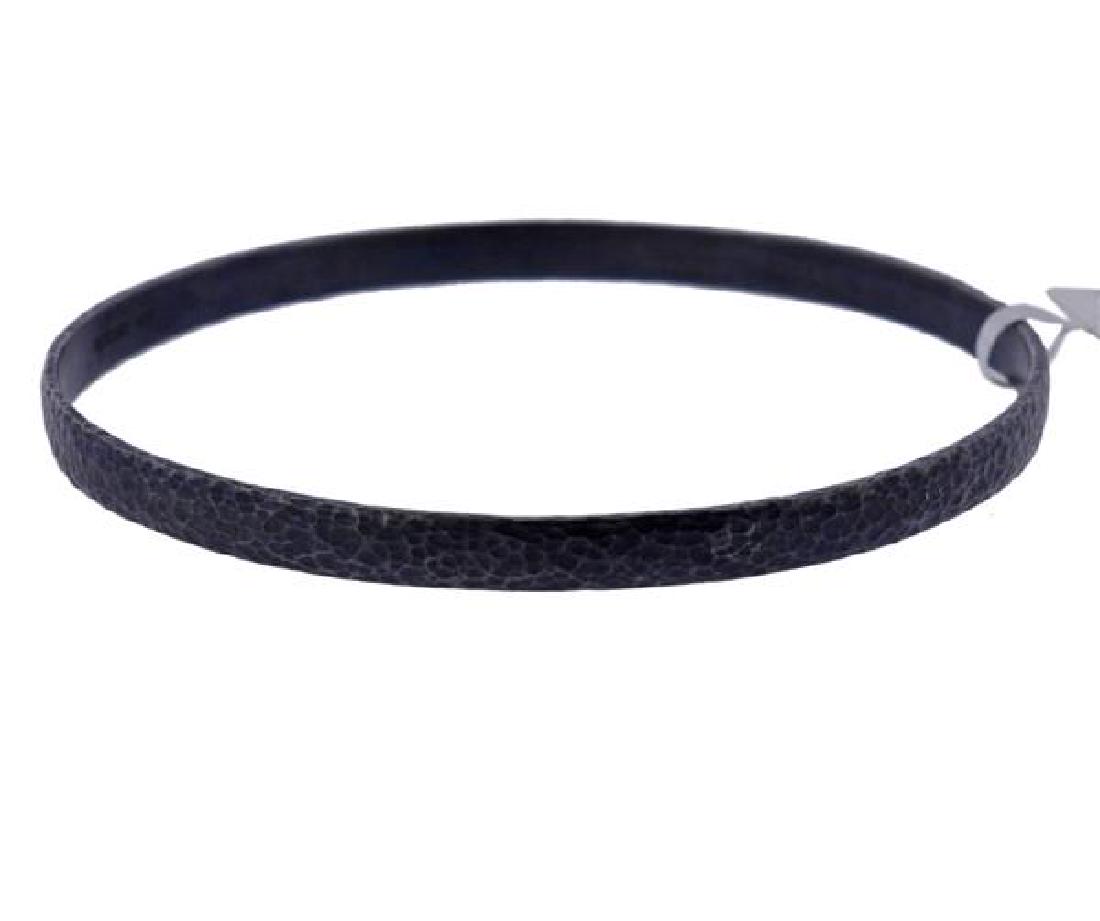 Gurhan Midnight Blackened Silver Bangle Bracelet: METAL: blackened sterling silver. MEASUREMENTS: bracelet is 72mm in diameter and 5mm wide. MARKED: Gurhan 925. WEIGHT:15.9 grams. Retail $350. Gemstones have not been graded for color and clarity ,and