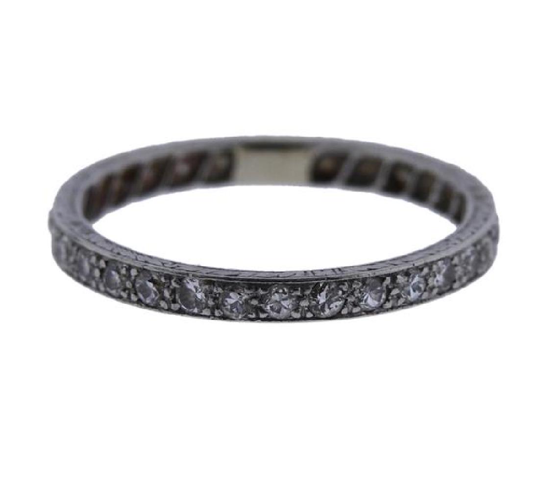 Platinum Diamond Eternity Wedding Band Ring: METAL: platinum. GEMSTONES: diamonds. MEASUREMENTS: ring size 8.5. Band is 2.5mm wide. TESTED: platinum. WEIGHT: 2.5 grams.Gemstones have not been graded for color and clarity ,and tested for clarity