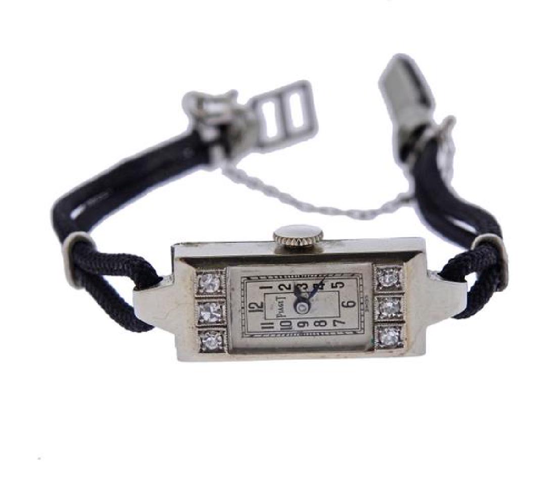Art Deco Piaget 18K Gold Diamond Lady's Watch: METAL: 18K gold. GEMSTONES: diamonds. MEASUREMENTS: case is 9mm excl. crown x 30mm lug tip to lug tip. Bracelet clasp is not gold, total bracelet length is 6". White dial with Arabic numerals and