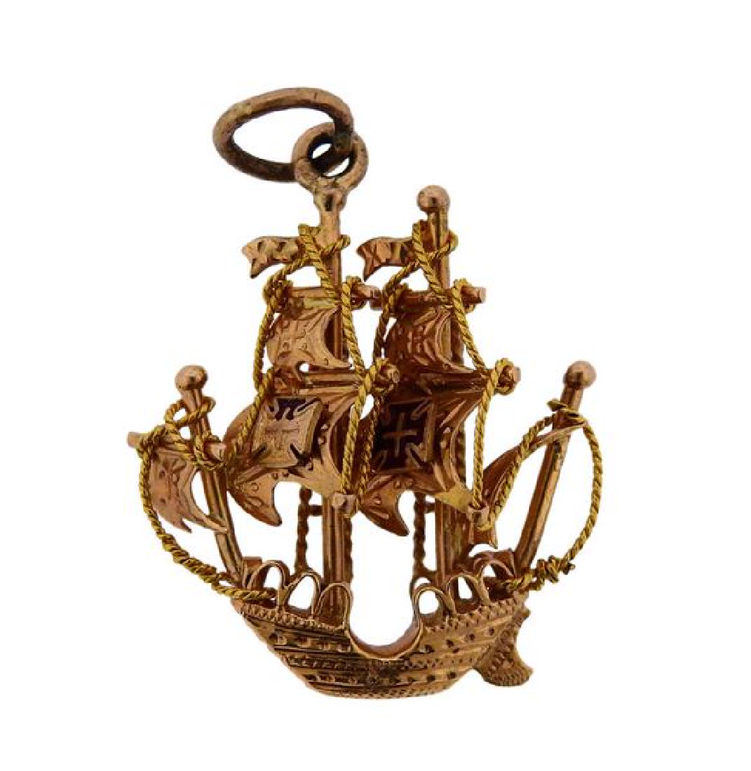 18K Gold Sail Boat Charm Pendant: METAL: 18K gold. MEASUREMENTS: charm is 27mm long x 23mm at widest point. Enamel on flags almost lost. TESTED: 18K. WEIGHT: 3.8 grams.Gemstones have not been graded for color and clarity ,and tested f