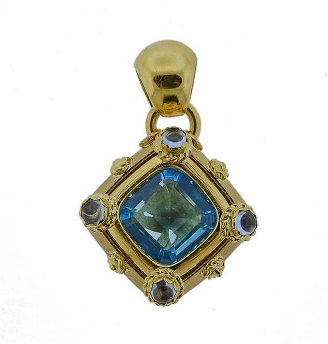 18K Gold Blue Topaz Moonstone Pendant: METAL: 18k gold. GEMSTONES: Blue topaz. Moonstones. MEASUREMENTS: Pendant is 40mm x 27mm. MARKED: 750 Oridiam. WEIGHT: 13 grams. Gemstones have not been graded for color and clarity ,and tested for cl