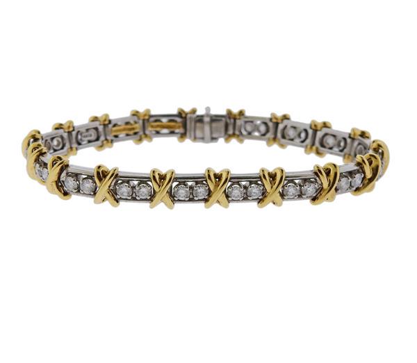 Tiffany & Co Schlumberger 36 Stone Diamond Platinum: METAL: 18k Gold/ Platinum. MEASUREMENTS: Bracelet is 7" long and 8mm wide. GEMSTONES: Diamonds approx. 2.95ctw. Retail $26500. MARKED: TIffany & Co, pt950, Schlumberger Studios. WEIGHT: 37.4 