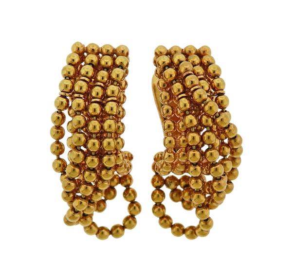 Cartier Draperie De Decolette 18K Gold Earrings: METAL: 18k gold. MEASUREMENTS: Earrings are 35mm x 8mm. MARKED: Cartier 750, 995251. WEIGHT: 19.8 grams.Gemstones have not been graded for color and clarity ,and tested for clarity and color enhanceme