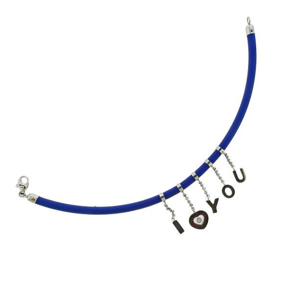Chopard Happy Diamonds 18K Gold I Love You Charm Cord: METAL: 18k Gold/ Rubber cord. GEMSTONES: Diamond approx. 0.03ct. MEASUREMENTS: Bracelet is 7" long x 3.9mm wide. Charms are approx. 20mm long x 10mm wide. MARKED: Chopard 750217417 1 85/3895. WEI