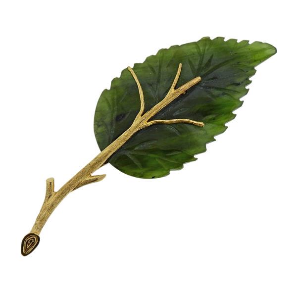 14K Gold Carved Nephrite Leaf Brooch: METAL: 14K gold. GEMSTONES: carved nephrite. MEASUREMENTS: brooch is 82mm long x 31mm at widest point. MARKED: 14K, maker's mark. WEIGHT: 16.7 grams.Gemstones have not been graded for color and cl