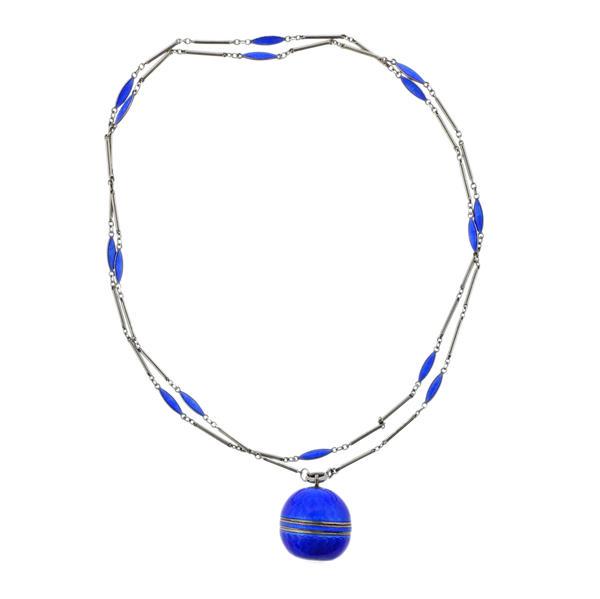 Bucherer Antique Silver Guilloche Enamel Watch Necklace: METAL: Sterling Silver. MEASUREMENTS: Case - 22mm in diameter excl. crown. Necklace is 30" long. Dial signed Bucherer Lucerne Swiss, with black Arabic markers. MOVEMENT: MAnual wind, running orde