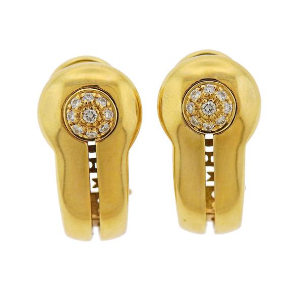Dimodolo 18K Gold Diamond Earrings: METAL: 18k Gold. GEMSTONES: Diamonds approx. 0.10ctw. MEASUREMENTS: Earrings are 18mm x 9mm. MARKED: DM 750 Maker's Mark. WEIGHT: 8.3 grams.Gemstones have not been graded for color and clarity ,an