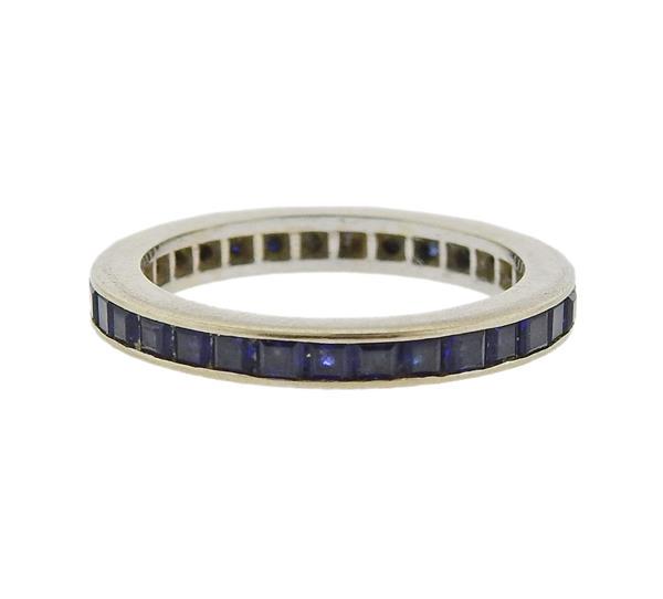 14k Gold Blue Stone Eternity Wedding Band Ring: METAL: 14k Gold. MEASUREMENTS: Ring size - 5.5, ring is 2.7mm wide. GEMSTONES: Blue stones. TESTED: 14k. WEIGHT: 2.5 grams.Gemstones have not been graded for color and clarity ,and tested for clarity 